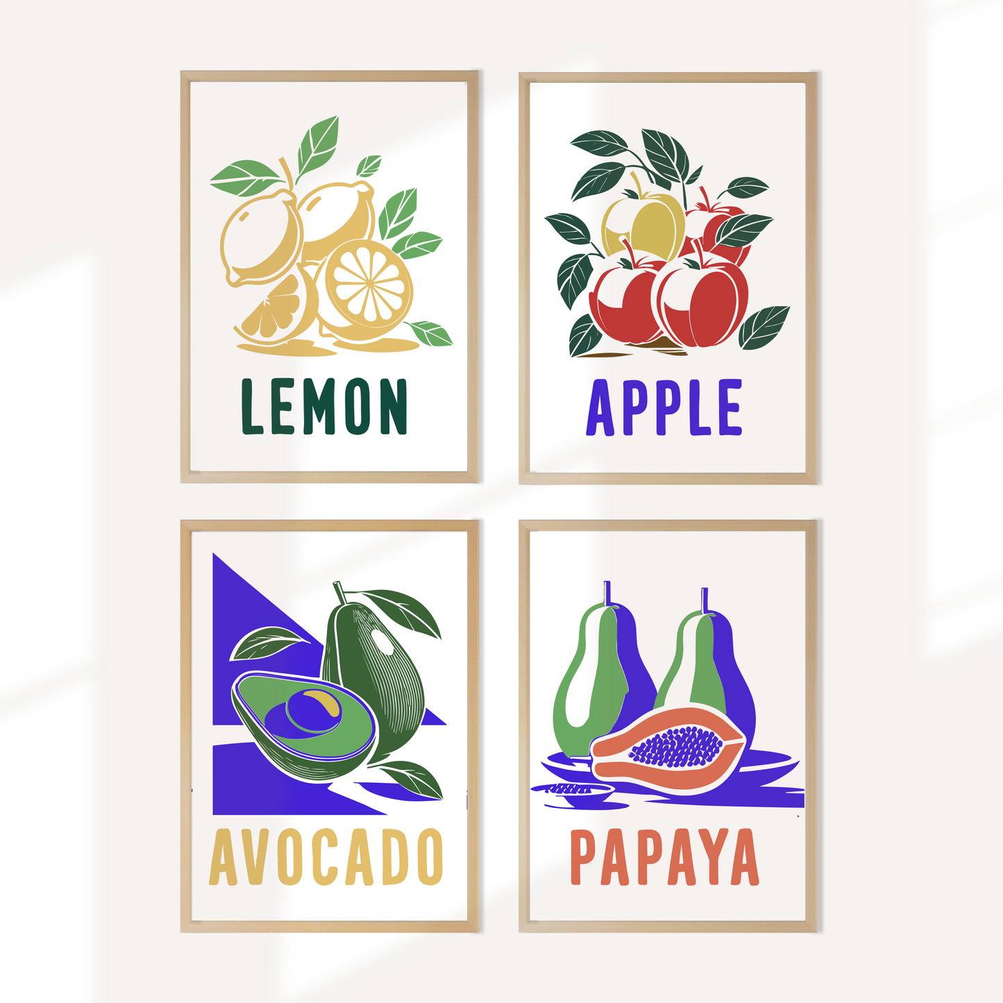 Vibrant fruit art wall set featuring lemon, apple, avocado, and papaya prints for modern home decor.